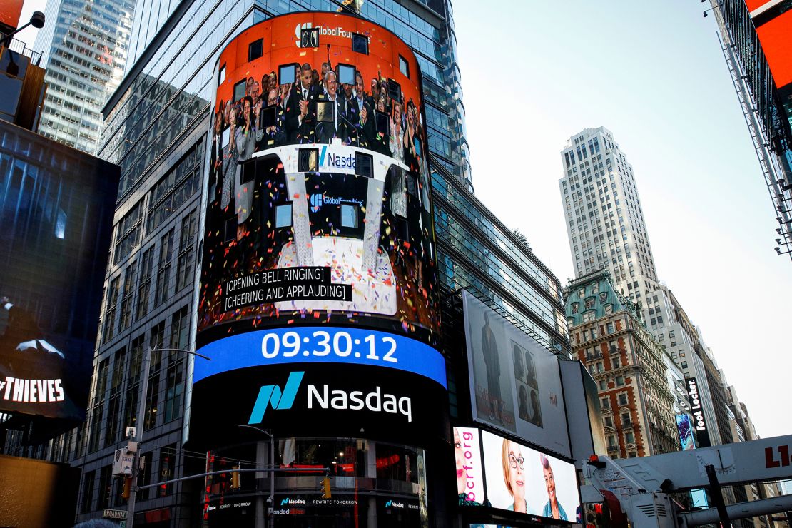 A screen displays the opening bell ceremony for information for semiconductor and chipmaker GlobalFoundries Inc. during the company's IPO at the Nasdaq MarketSite in Times Square in New York City, on October 28, 2021.