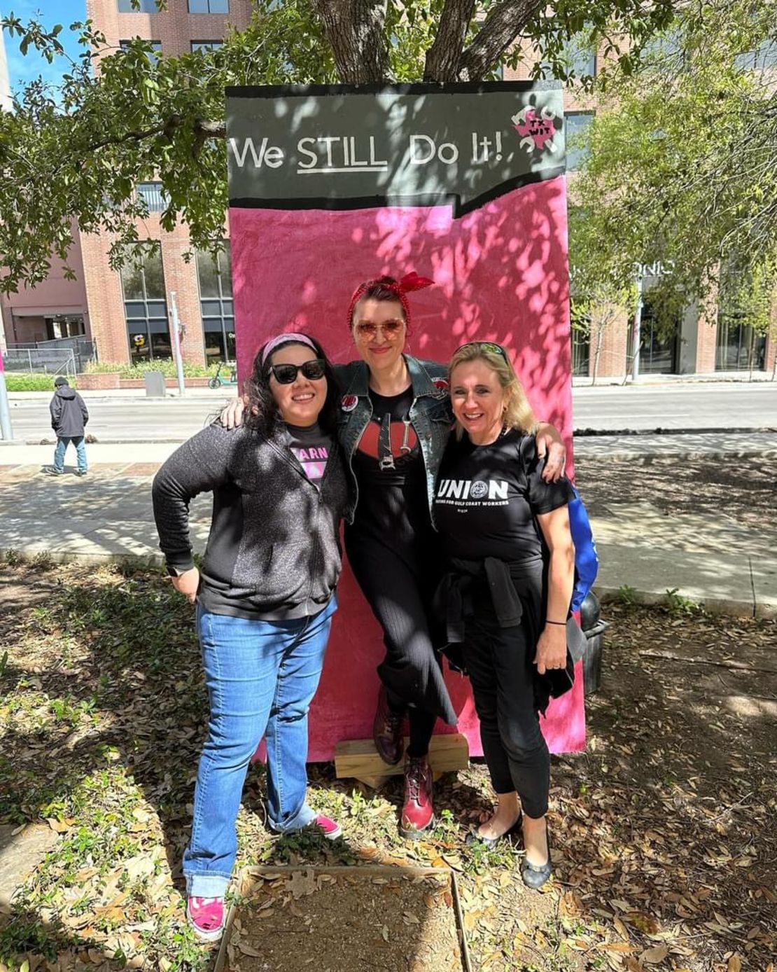 From left to right: Allie Perez, of Texas Women in Trades; Blythe Zemel, founder of Girl with Grit; and Ginny Stogner McDavid, president of the Harris County AFL-CIO, at the second annual Women In Construction parade and rally on March 9, 2024, in downtown San Antonio.